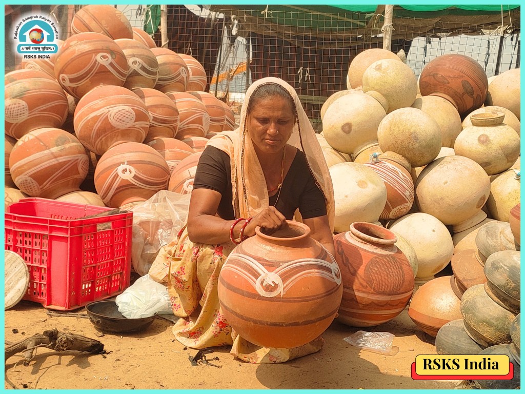 A woman carefully examining a clay pot in a market filled with various pottery items.